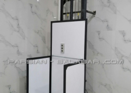 نمونه بالابر کارگاهی حفاظ دار نصب در انبار